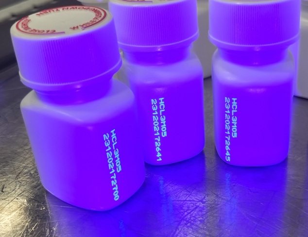 Bottles in UV light tracking codes